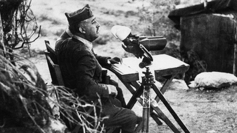 Madrid, SPAIN: An undated and unlocated picture of General Francisco Franco watching the front during the Civil War. Spain marked 70 years since the outbreak of the Spanish Civil War, 18 July 2006 as opinion polls acknowledged divisions still run deep over the legacy of a conflict which left half a million dead. Traditionally, since General Francisco Franco's Nationalist forces triumphed and disbanded the elected institutions of the Second Republic replacing them with a military dictatorship, Spaniards have marked the date in low-key fashion, maintaining a so-called "pact of silence." AFP PHOTO (Photo credit should read /AFP/Getty Images)