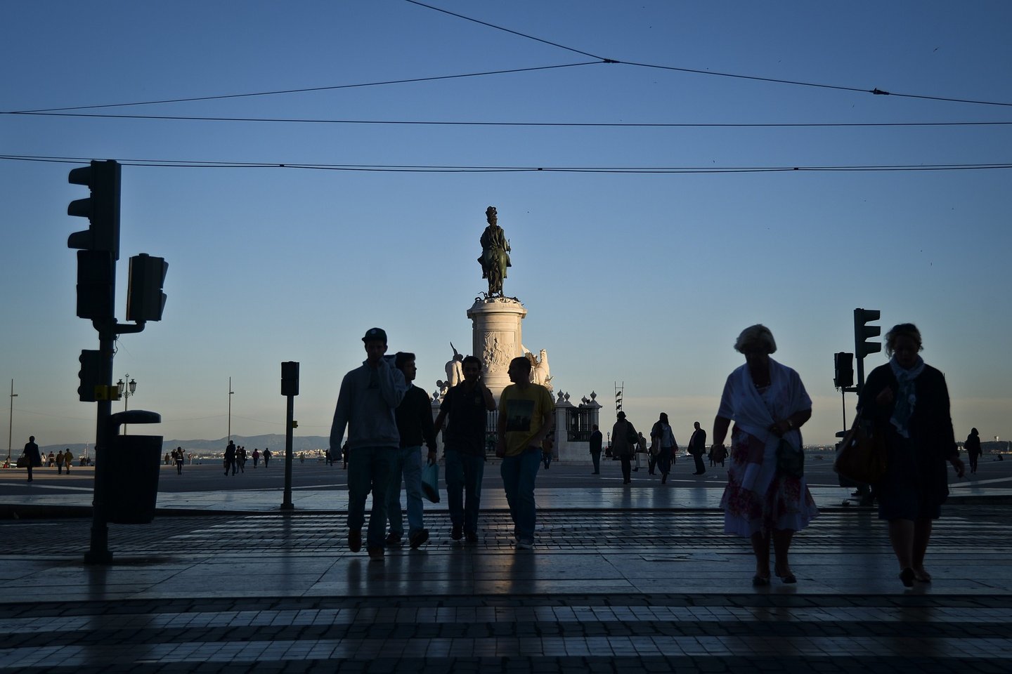 A picture taken on April 28, 2014 shows people passing by Terreiro do Paco Square in downtown Lisbon. AFP PHOTO / PATRICIA DE MELO MOREIRA (Photo credit should read PATRICIA DE MELO MOREIRA/AFP/Getty Images)