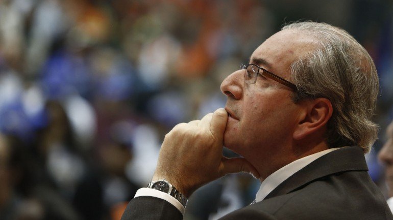 The president of the Brazilian Chamber of Deputies, Eduardo Cunha, from the Brazilian Democratic Movement Party (PMDB) meets with union workers in Sao Paulo, Brazil, on August 21, 2015. Cunha, speaker of the Chamber of Deputies, was alleged to have taken at least $5 million in bribes as part of a sprawling kickbacks scheme centered on state oil company Petrobras. AFP PHOTO / Miguel SCHINCARIOL (Photo credit should read Miguel Schincariol/AFP/Getty Images)