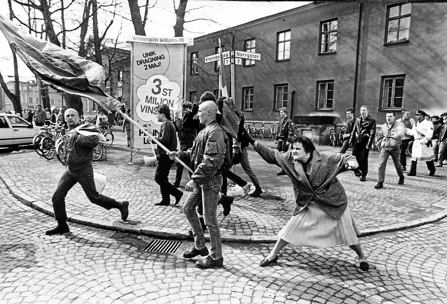A woman hitting a neo-Nazi with her handbag, Sweden, 1985 - Hans Runesson