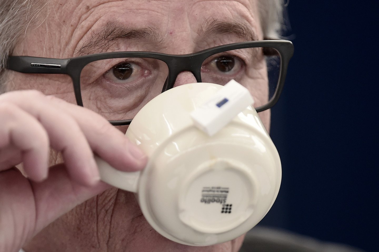 European Commission's President Jean-Claude Juncker takes a drink as he attends a debate on the 13 November terrorist attacks in Paris and subsequent police and military operations at the European Parliament in Strasbourg, eastern France, on November 25, 2015. AFP PHOTO/FREDERICK FLORIN / AFP / FREDERICK FLORIN (Photo credit should read FREDERICK FLORIN/AFP/Getty Images)