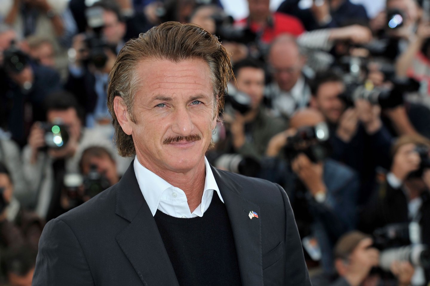 CANNES, FRANCE - MAY 18: Actor Sean Penn poses at the "Haiti Carnaval In Cannes" photocall during the 65th Annual Cannes Film Festival on May 18, 2012 in Cannes, France. (Photo by Gareth Cattermole/Getty Images)