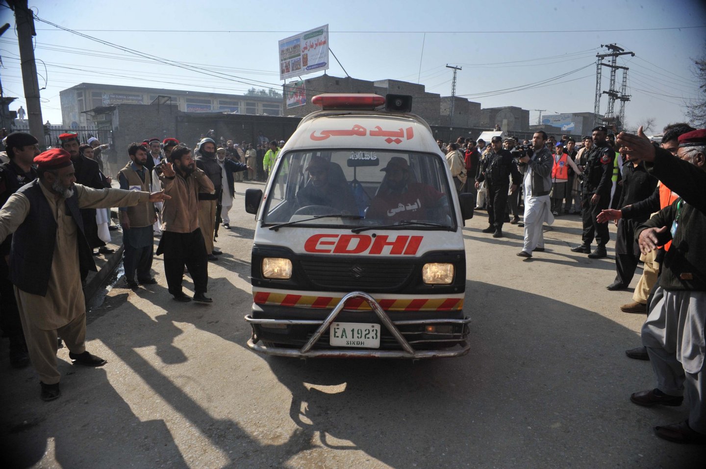 An ambulance carrying injured victims enters a hospital following an attack by gunmen at Bacha Khan university in Charsadda, about 50 kilometres from Peshawar, on January 20, 2016. At least 21 people died in an armed assault on a university in Pakistan on January 20, where witnesses reported two large explosions as security forces moved in under dense fog to halt the bloodshed. AFP PHOTO / Hasham AHMED / AFP / HASHAM AHMED (Photo credit should read HASHAM AHMED/AFP/Getty Images)