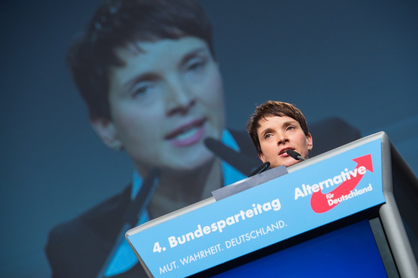 HANOVER, GERMANY - NOVEMBER 28: Chairwoman Frauke Petry delivers her speech during the AfD (Alternative fuer Deutschland) federal party congress on November 28, 2015 in Hanover, Germany. The AFD aims to enter three new state parliaments in 2016 by luring conservative voters angry with Chancellor Angela Merkel's open-door asylum policy. This weekend the party will outline its plan to bring order to what it calls the "asylum chaos." (Photo by Nigel Treblin/Getty Images)