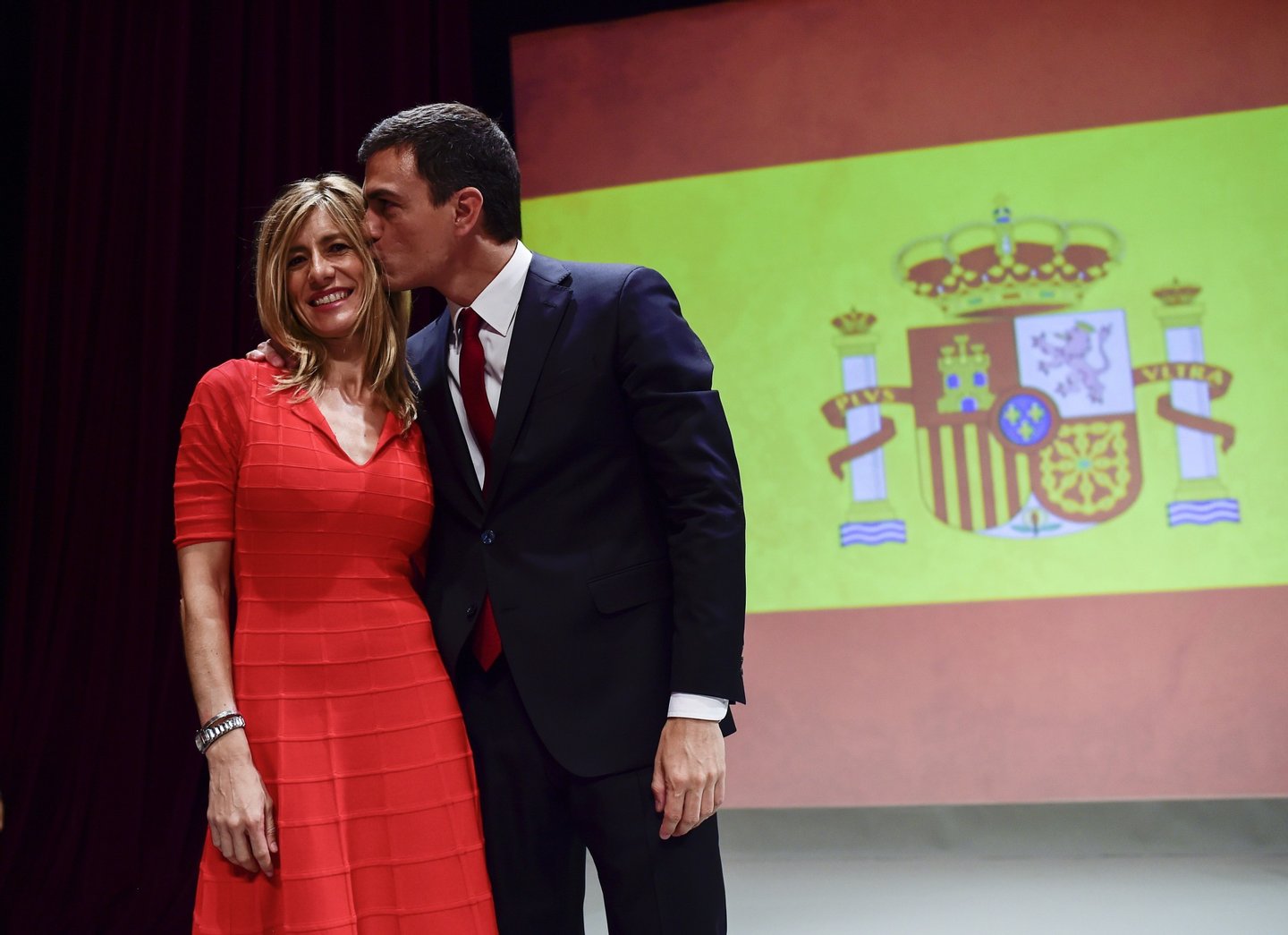Secretary general of Spanish Socialist Party (PSOE) Pedro Sanchez (R) kisses his wife Begona Fernandez after delivering a speech during his official presentation as PSOE candidate for next general elections, at the Price Circus in Madrid on June 21, 2015. AFP PHOTO/ DANI POZO (Photo credit should read DANI POZO/AFP/Getty Images)