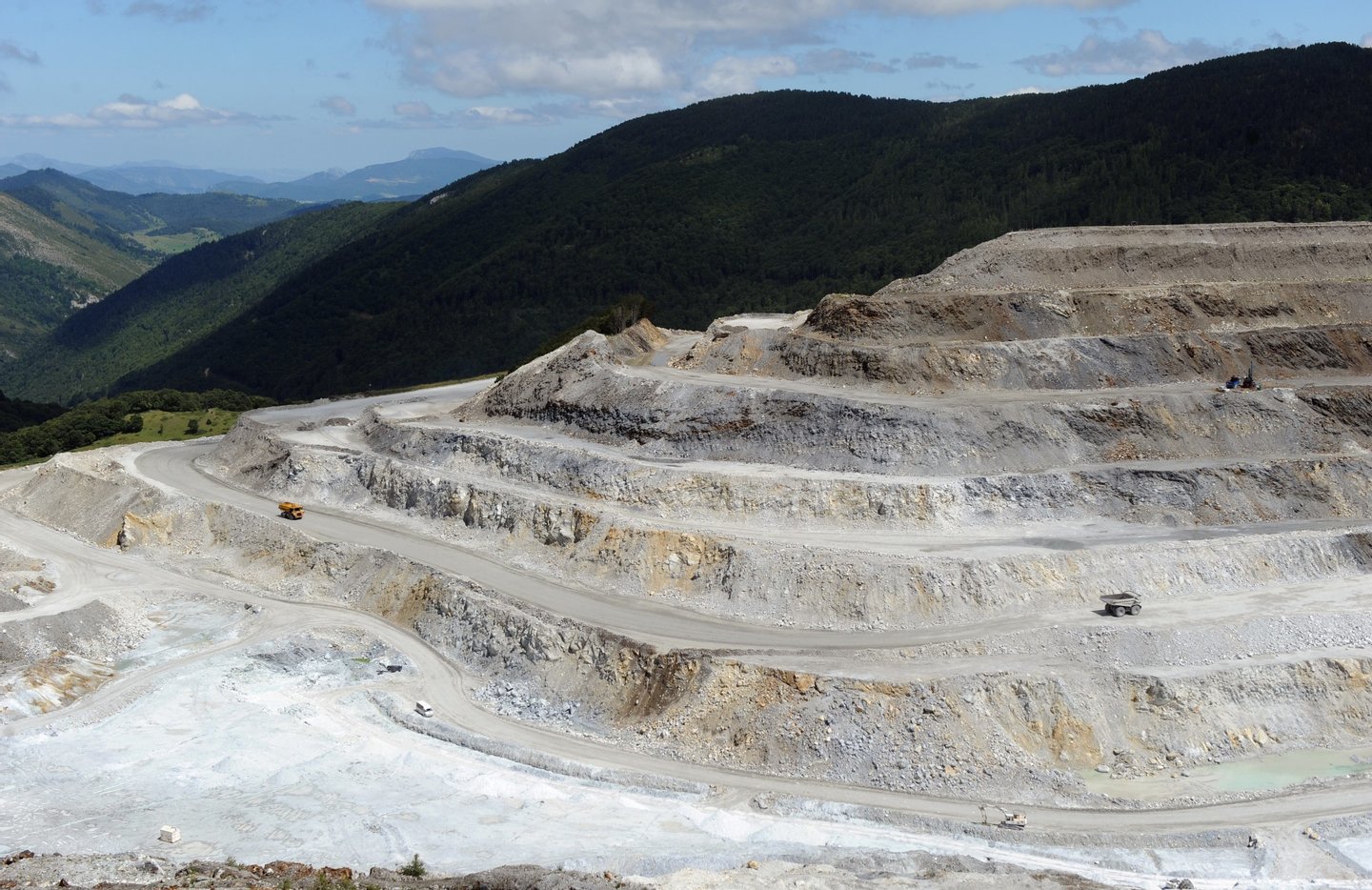 Photo taken on July 20, 2011 shows the largest talc quarry in Europe at an altitude of 1800 metres near the village of Luzenac, southern France. Talc (hydrated magnesium silicate) is a very soft mineral that is the main component of talcum powder. After being quarried, the rock is crushed into powder form and is also used in paper, plastics, cosmetics and paints. AFP PHOTO / ERIC CABANIS (Photo credit should read ERIC CABANIS/AFP/Getty Images)