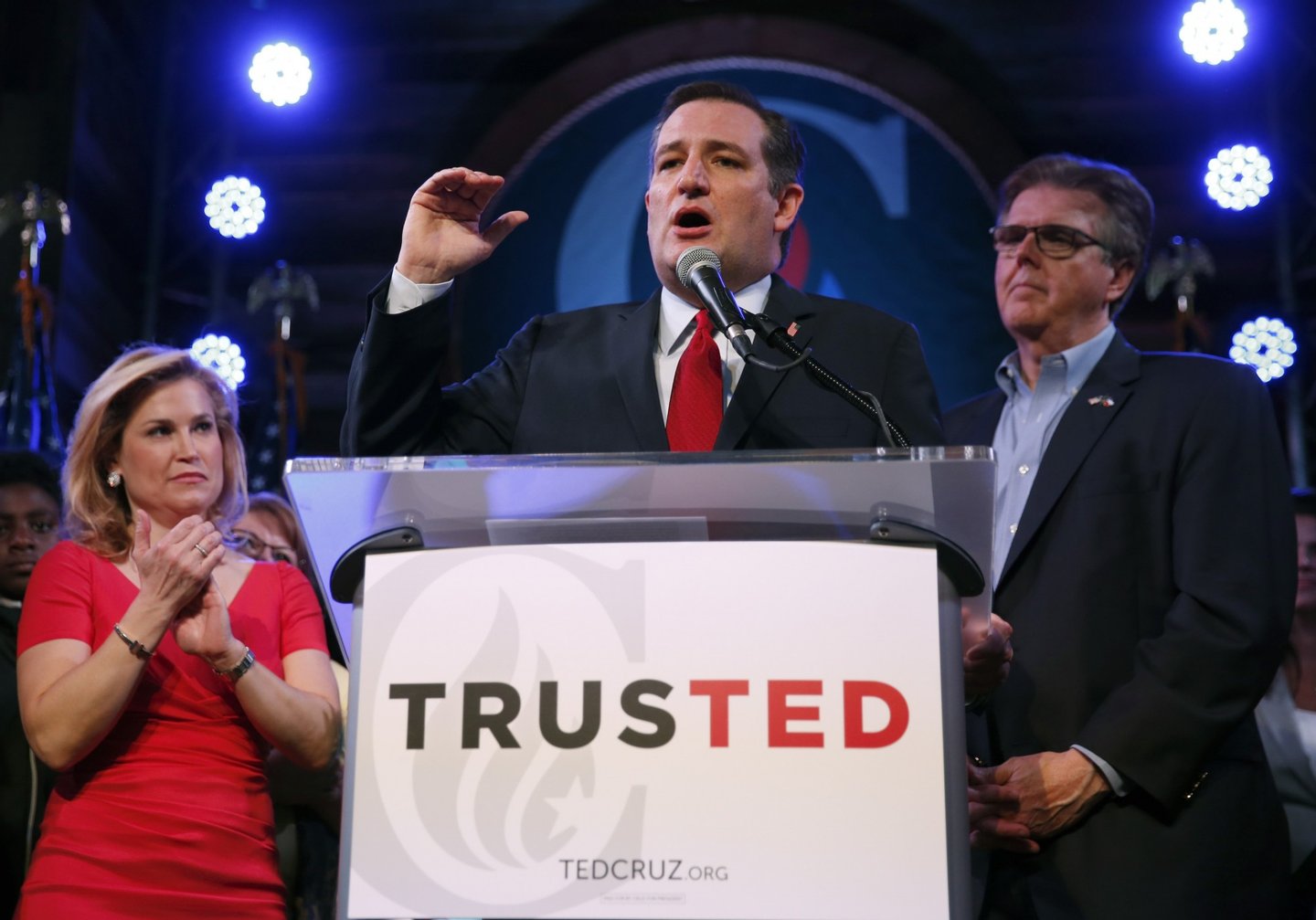 STAFFORD, TX - MARCH 1: Republican presidential candidate, Sen. Ted Cruz (R-TX), with wife Heidi and Texas Attorney General Dan Patrick by his side, celebrates at a Super Tuesday watch party at the Redneck Country Club March 1, 2016 in Stafford, Texas. Cruz won the Texas and Florida primaries. (Photo by Erich Schlegel/Getty Images)