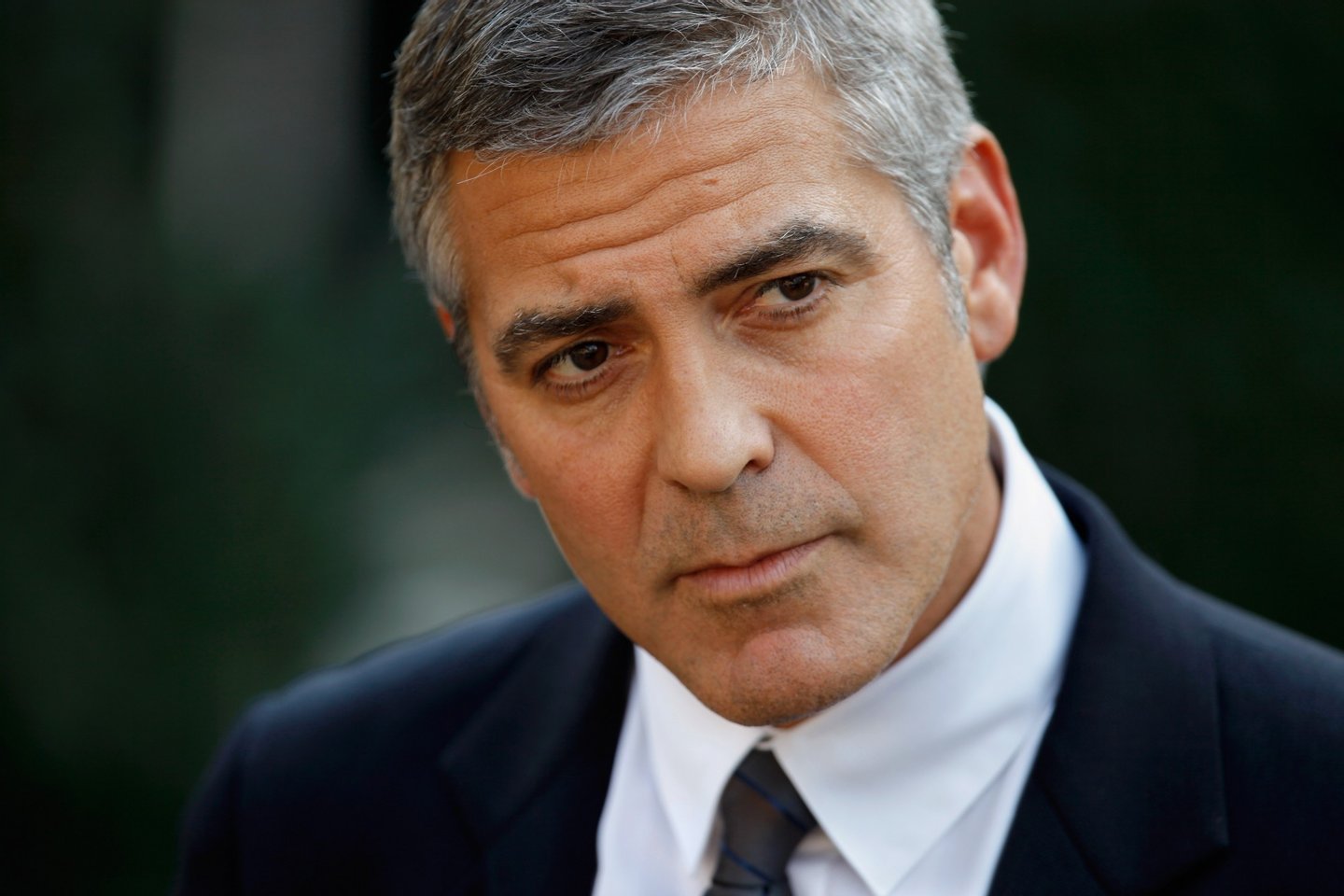 WASHINGTON - OCTOBER 12: Oscar-nominated actor, screen-writer and director George Clooney answers reporters' questions after meeting with U.S. President Barack Obama at the White House October 12, 2010 in Washington, DC. Clooney and human rights activist and co-founder of the Enough Project John Prendergast met with Obama to discuss their recent trip to Sudan and the threat there of a war ahead of a referendum election. (Photo by Chip Somodevilla/Getty Images)