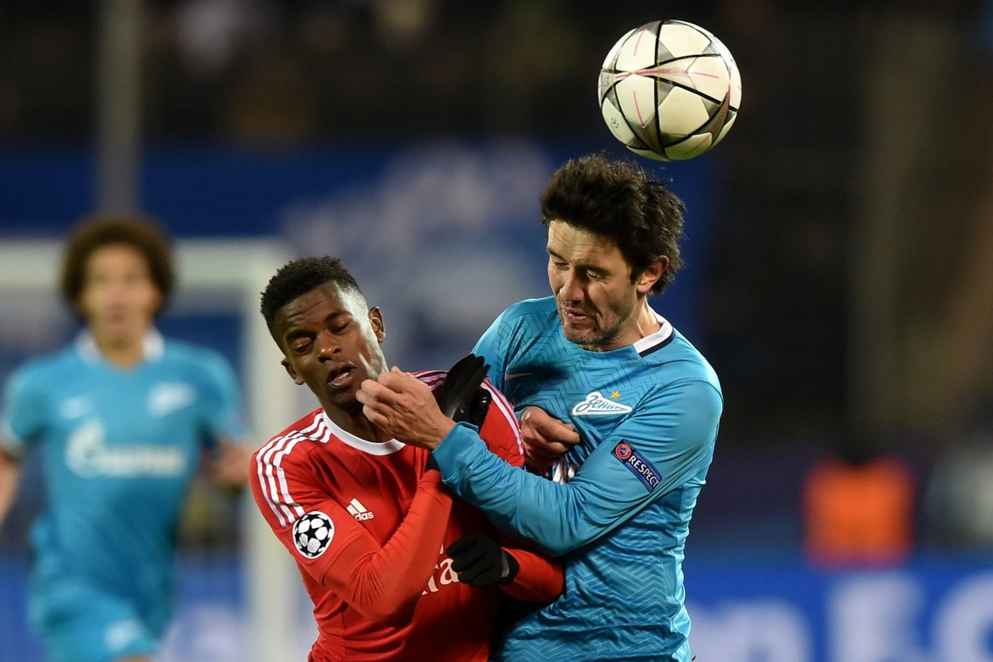 Benfica's defender Nelson Semedo (L) vies for the ball with Zenit's midfielder Yuri Zhirkov during the second-leg round of 16 UEFA Champions League football match FC Zenit vs SL Benfica at the Petrovsky stadium in St. Petersburg on March 9, 2016. AFP PHOTO / KIRILL KUDRYAVTSEV / AFP / KIRILL KUDRYAVTSEV (Photo credit should read KIRILL KUDRYAVTSEV/AFP/Getty Images)