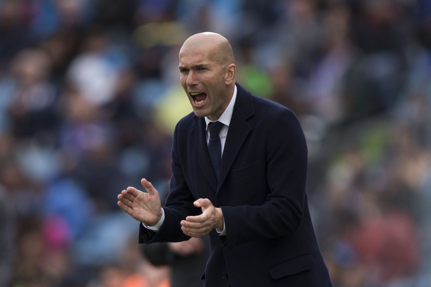 GETAFE, SPAIN - APRIL 16: Coach Zinedine Zidane of Real Madrid CF encourages his team during the La Liga match between Getafe CF and Real Madrid CF at Coliseum Alfonso Perez on April 16, 2016 in Getafe, Spain. (Photo by Gonzalo Arroyo Moreno/Getty Images)