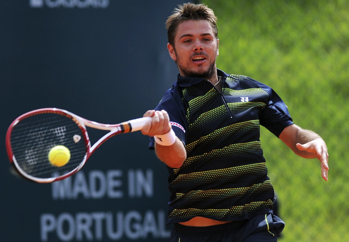 Switzerland's Stanislas Wawrinka returns the ball to Netherlands' Robin Haase during their Estoril Open tennis tournament quarter-final match in Oeiras, on the outskirts of Lisbon, on May 4, 2012. Wawrinka won 6-1, 6-4. AFP PHOTO / FRANCISCO LEONG (Photo credit should read FRANCISCO LEONG/AFP/GettyImages)