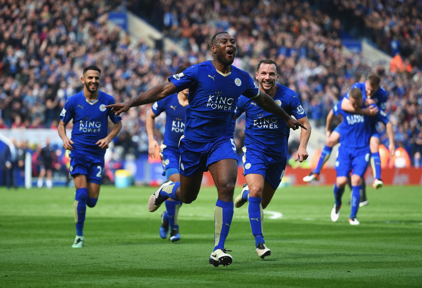 LEICESTER, ENGLAND - APRIL 03: Wes Morgan of Leicester City celebrates with team mates as he scores their first goal during the Barclays Premier League match between Leicester City and Southampton at The King Power Stadium on April 3, 2016 in Leicester, England. (Photo by Michael Regan/Getty Images)