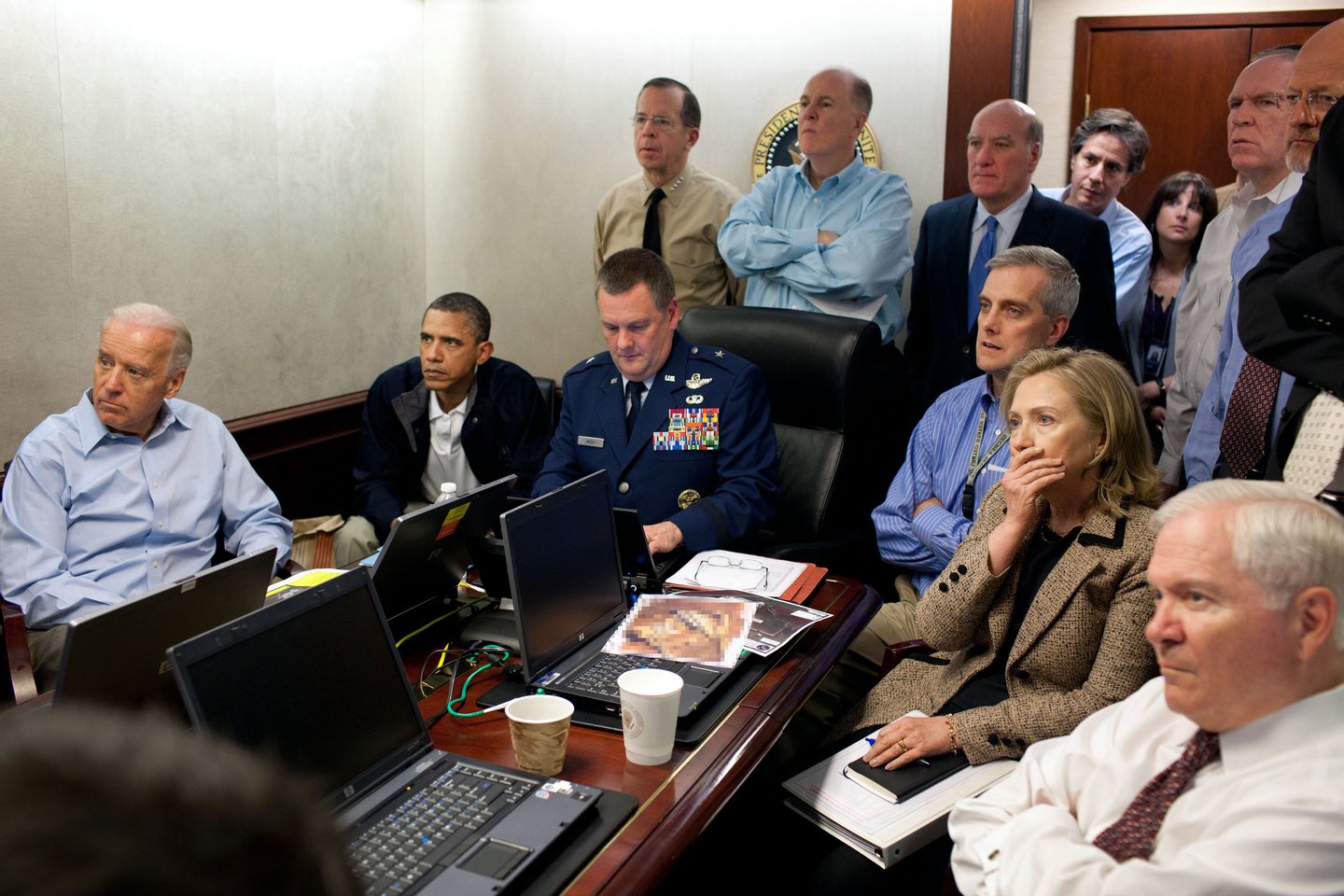 WASHINGTON, DC - MAY 1: (EDITORS NOTE: Please be advised that a classified document visible in this photo was obscured by The White House) In this handout image provided by The White House, President Barack Obama, Vice President Joe Biden, Secretary of State Hillary Clinton and members of the national security team receive an update on the mission against Osama bin Laden in the Situation Room of the White House May 1, 2011 in Washington, DC. Obama later announced that the United States had killed Bin Laden in an operation led by U.S. Special Forces at a compound in Abbottabad, Pakistan. (Photo by Pete Souza/The White House via Getty Images)