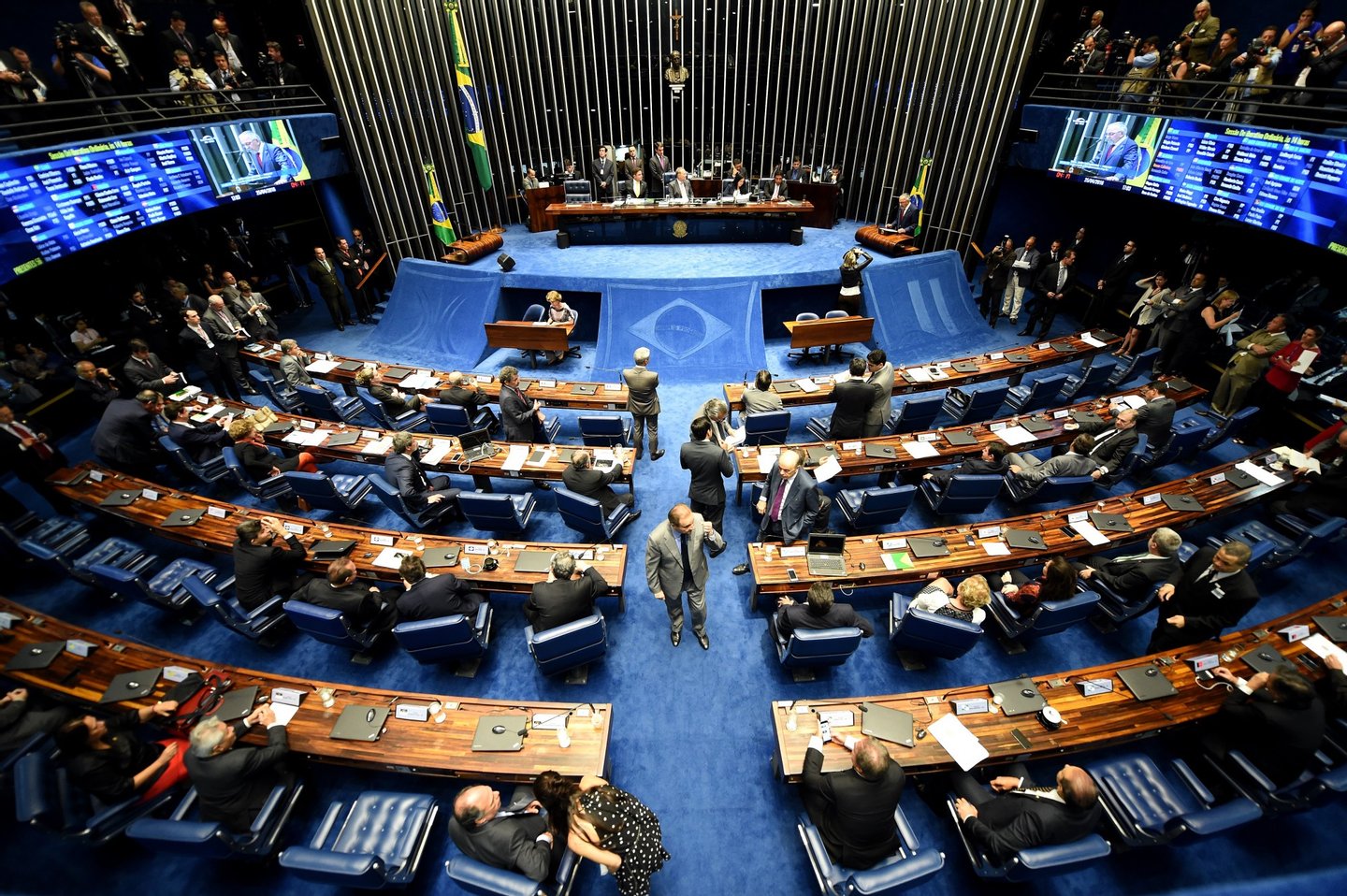 Picture taken during a Brazilian Senate's session to form a committee that will consider whether to impeach President Dilma Rousseff, in Brasilia, on April 25, 2016. Brazil's Senate met Monday to form a committee that will consider whether to impeach Rousseff, who has accused her opponents of mounting a constitutional coup. She is accused of illegal government accounting maneuvers, but says she has not committed an impeachment-worthy crime. The Senate committee -- comprising 21 of the 81 senators -- was to debate Rousseff's fate for up to 10 working days before making a recommendation to the full upper house. / AFP / EVARISTO SA (Photo credit should read EVARISTO SA/AFP/Getty Images)
