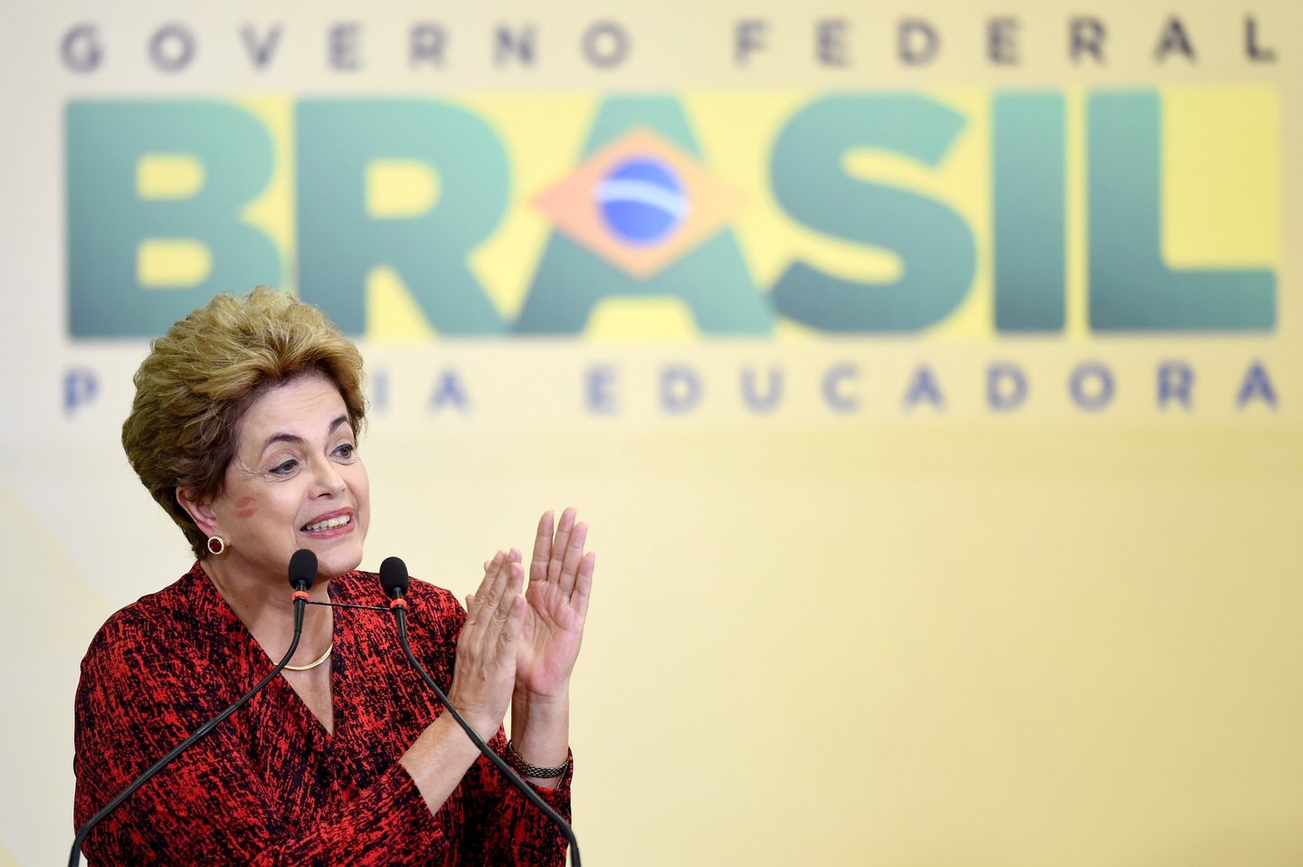TOPSHOT - Brazilian President Dilma Rousseff during a ceremony to announce the creation of new public universities, at Planalto Palace in Brasilia, on May 9, 2016. The impeachment of Brazilian President Dilma Rousseff was thrown into confusion when Waldir Maranhao, the interim speaker of the lower house of Congress annulled on May 9, 2016 an April vote by lawmakers to launch the process. He wrote in an order that a new vote should take place on whether to impeach Rousseff. / AFP / EVARISTO SA (Photo credit should read EVARISTO SA/AFP/Getty Images)