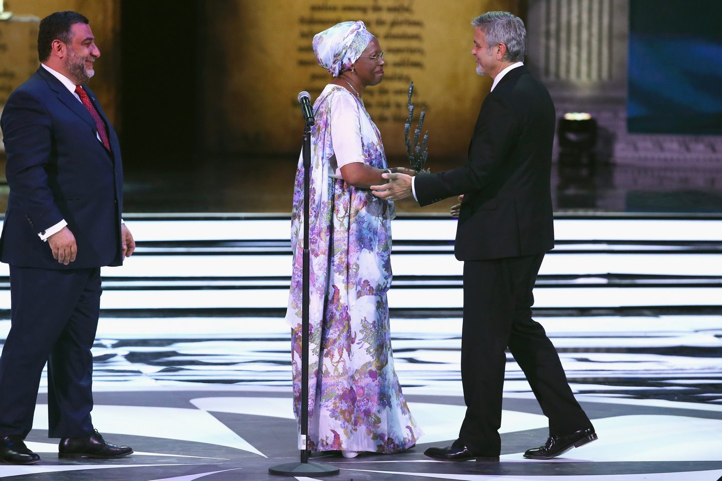 YEREVAN, ARMENIA - APRIL 24:  Aurora Prize Co-Founder Ruben Vardanyan, Aurora Prize finalist and Founder Maison Shalom, Marguerite Barankitse and Aurora Prize  Selection Committee Co-Chair George Clooney on April 24, 2016 in Yerevan, Armenia.  (Photo by Andreas Rentz/Getty Images for 100 Lives)