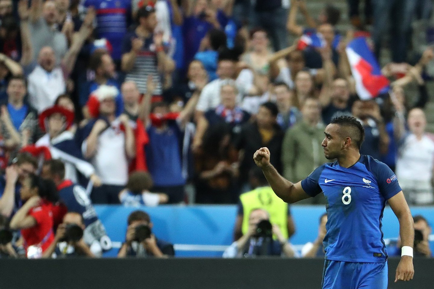 France's forward Dimitri Payet celebrates scoring France's second goal during the Euro 2016 group A football match between France and Romania at Stade de France, in Saint-Denis, north of Paris, on June 10, 2016. / AFP / KENZO TRIBOUILLARD (Photo credit should read KENZO TRIBOUILLARD/AFP/Getty Images)