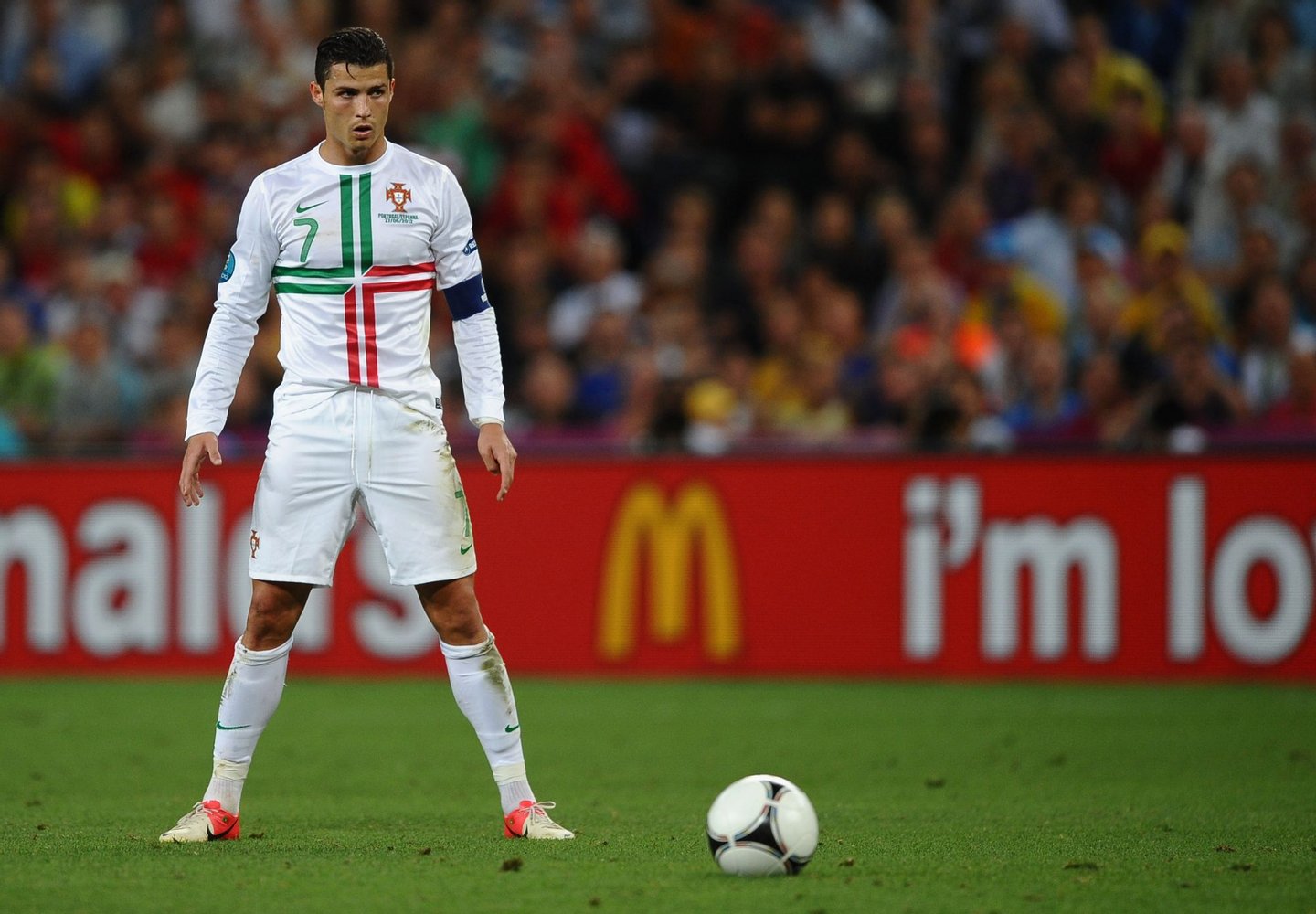 DONETSK, UKRAINE - JUNE 27: Cristiano Ronaldo of Portugal prepares to take a free kick during the UEFA EURO 2012 semi final match between Portugal and Spain at Donbass Arena on June 27, 2012 in Donetsk, Ukraine. (Photo by Laurence Griffiths/Getty Images)