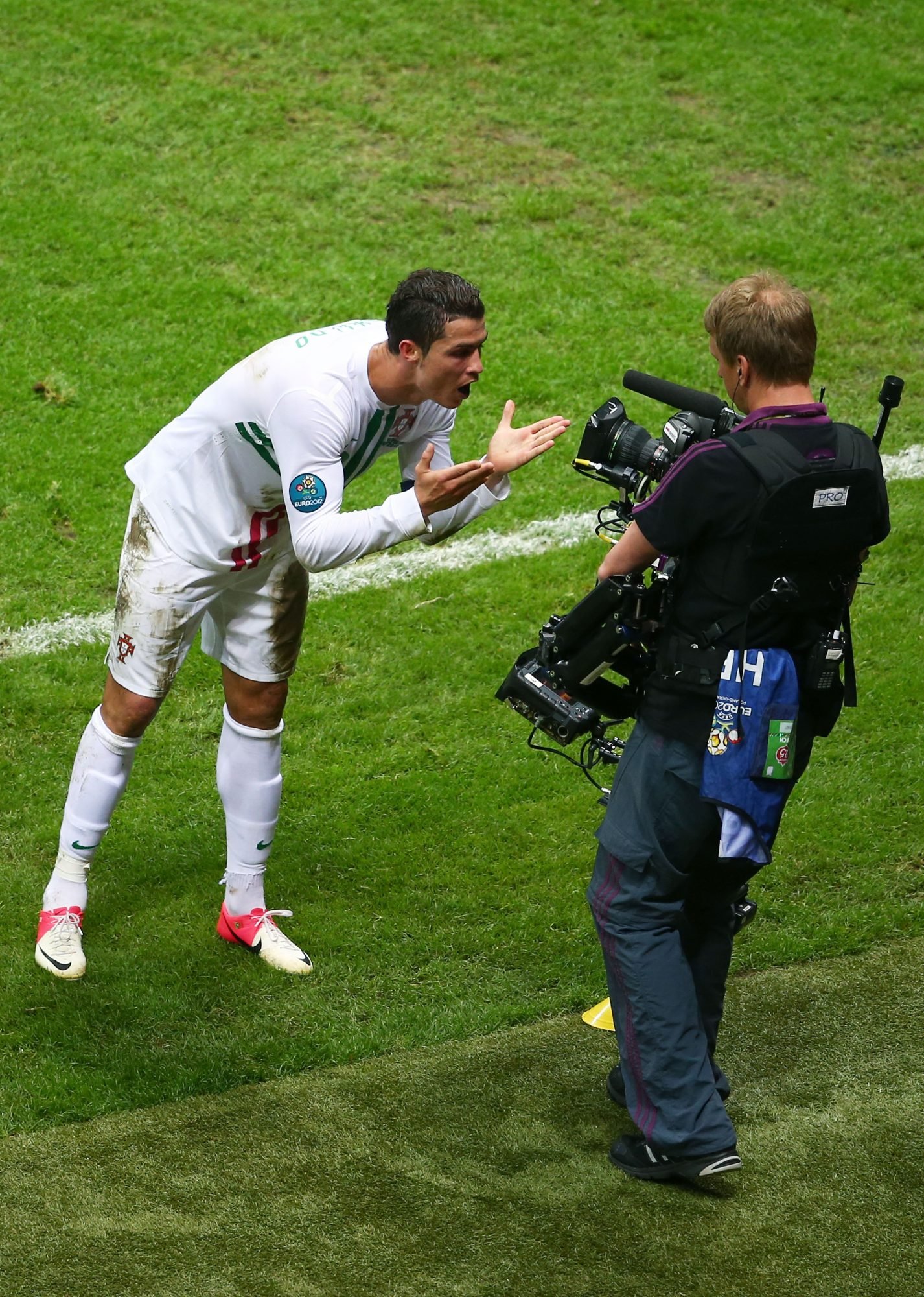 WARSAW, POLAND - JUNE 21: Cristiano Ronaldo of Portugal celebrates scoring the opening goal into a TV camera during the UEFA EURO 2012 quarter final match between Czech Republic and Portugal at The National Stadium on June 21, 2012 in Warsaw, Poland. (Photo by Michael Steele/Getty Images)