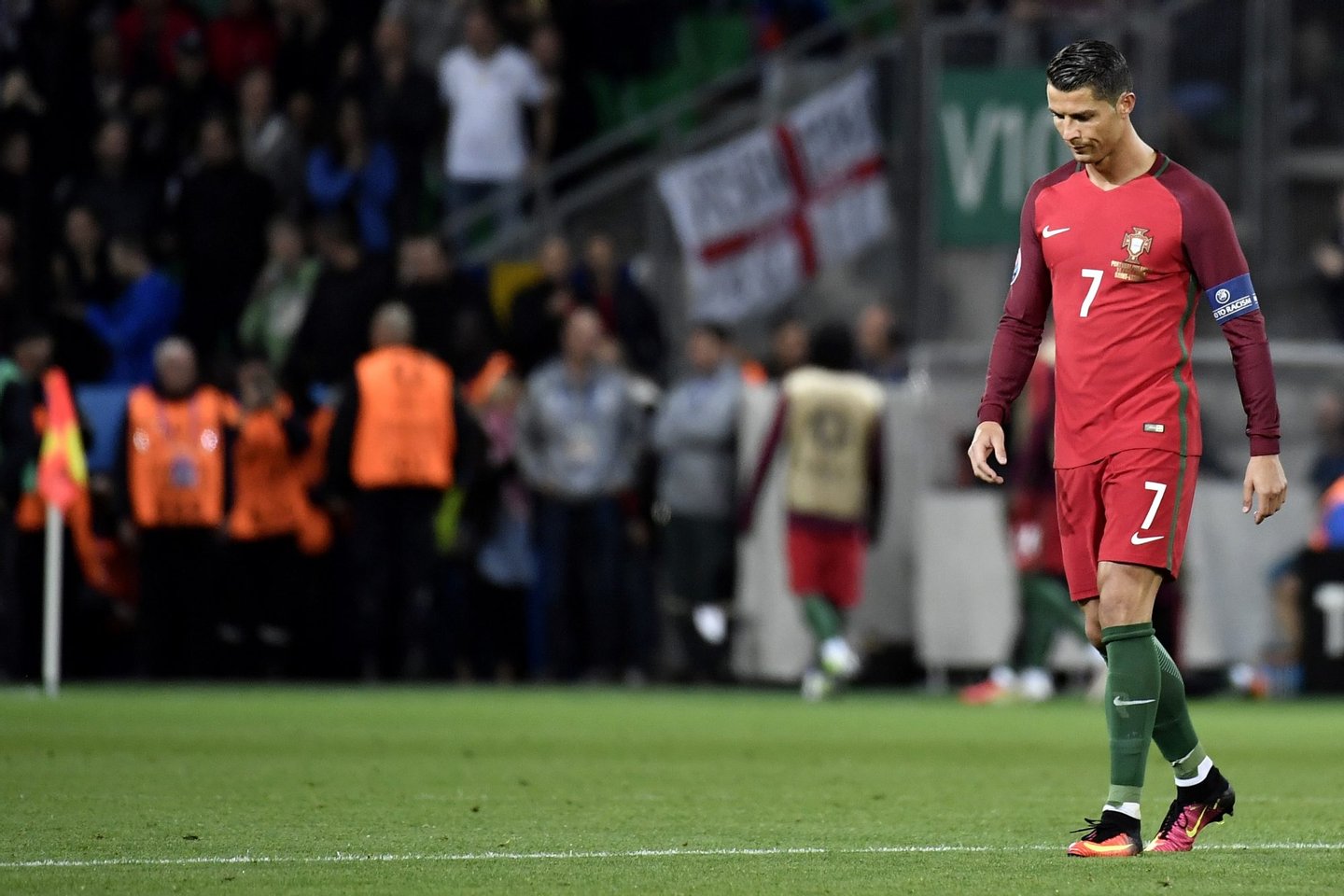 Portugal's forward Cristiano Ronaldo walks on the pitch during the Euro 2016 group F football match between Portugal and Iceland at the Geoffroy-Guichard stadium in Saint-Etienne on June 14, 2016. / AFP / jeff pachoud (Photo credit should read JEFF PACHOUD/AFP/Getty Images)