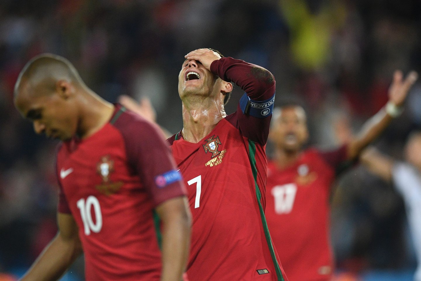 Portugal's forward Cristiano Ronaldo reacts after he missed to score a penalty during the Euro 2016 group F football match between Portugal and Austria at the Parc des Princes in Paris on June 18, 2016. / AFP / MARTIN BUREAU (Photo credit should read MARTIN BUREAU/AFP/Getty Images)