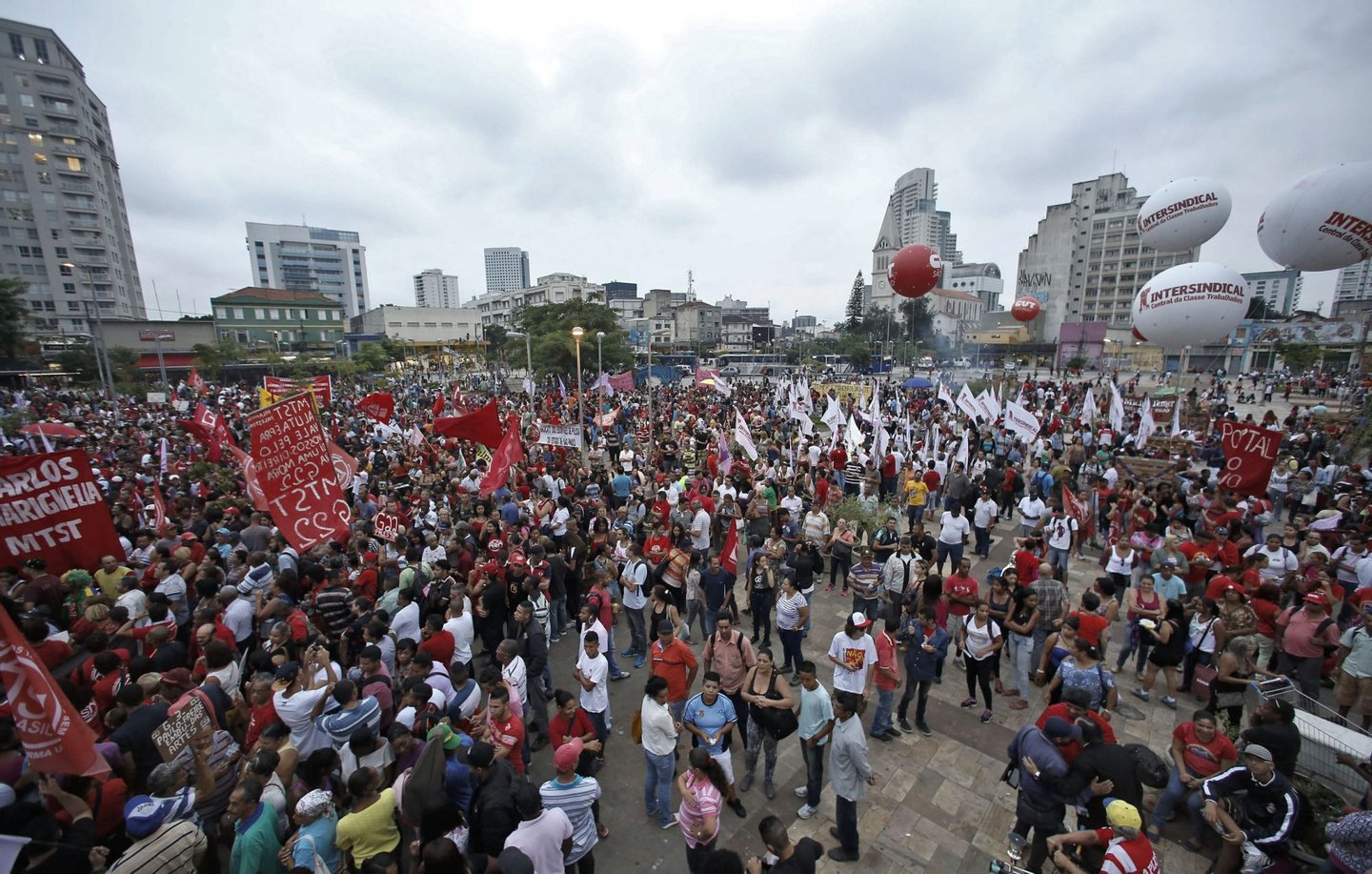 Members of the Landless Workers Movement (MTST) take part in a demonstration in Sao Paulo, Brazil on March 24, 2016. An MTST demonstration to defend a program of reforms, the demilitarization of the police and democracy took place Thursday in Sao Paulo. AFP PHOTO / Miguel SCHINCARIOL / AFP / Miguel Schincariol (Photo credit should read MIGUEL SCHINCARIOL/AFP/Getty Images)