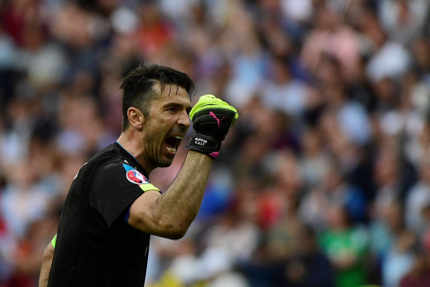 Italy's goalkeeper Gianluigi Buffon celebrates his team's win after the Euro 2016 round of 16 football match between Italy and Spain at the Stade de France stadium in Saint-Denis, near Paris, on June 27, 2016. Italy won the match 2:0. / AFP / PIERRE-PHILIPPE MARCOU (Photo credit should read PIERRE-PHILIPPE MARCOU/AFP/Getty Images)