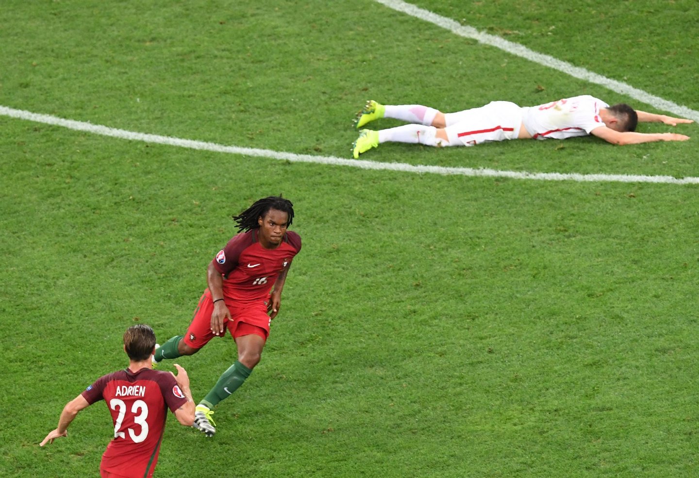 Portugal's midfielder Renato Sanches (C) celebrates next to Portugal's midfielder Adrien Silva after scoring during the Euro 2016 quarter-final football match between Poland and Portugal at the Stade Velodrome in Marseille on June 30, 2016. / AFP / BORIS HORVAT (Photo credit should read BORIS HORVAT/AFP/Getty Images)