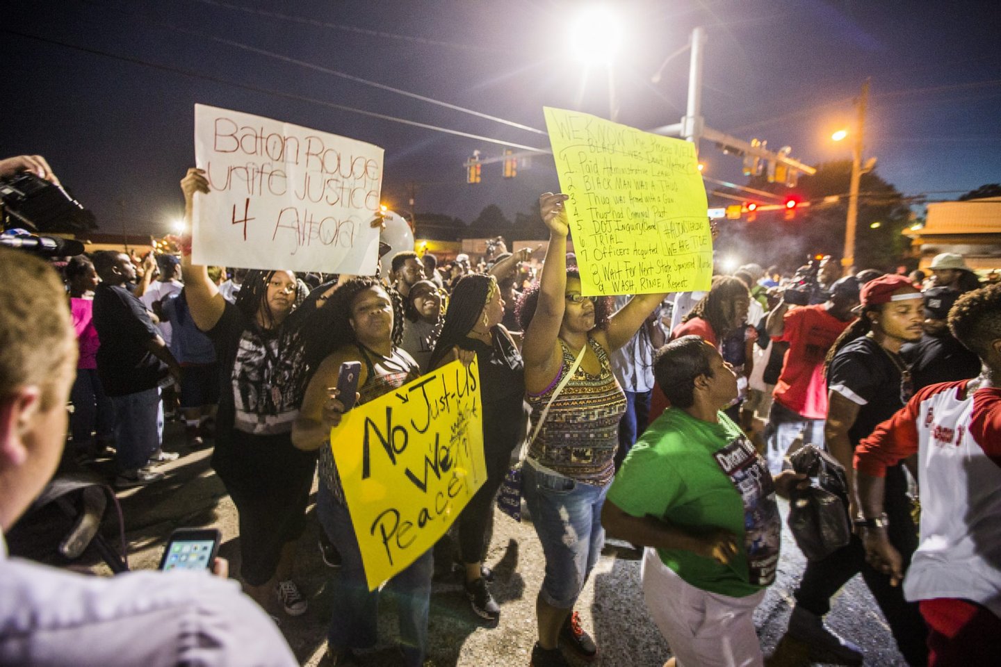 BATON ROUGE, LA -JULY 06: Protesters march to the convenience store where Alton Sterling was shot and killed, July 6, 2016 in Baton Rouge, Louisiana. Sterling was shot by a police officer in front of the Triple S Food Mart in Baton Rouge on Tuesday, July 5, leading the Department of Justice to open a civil rights investigation. (Photo by Mark Wallheiser/Getty Images)