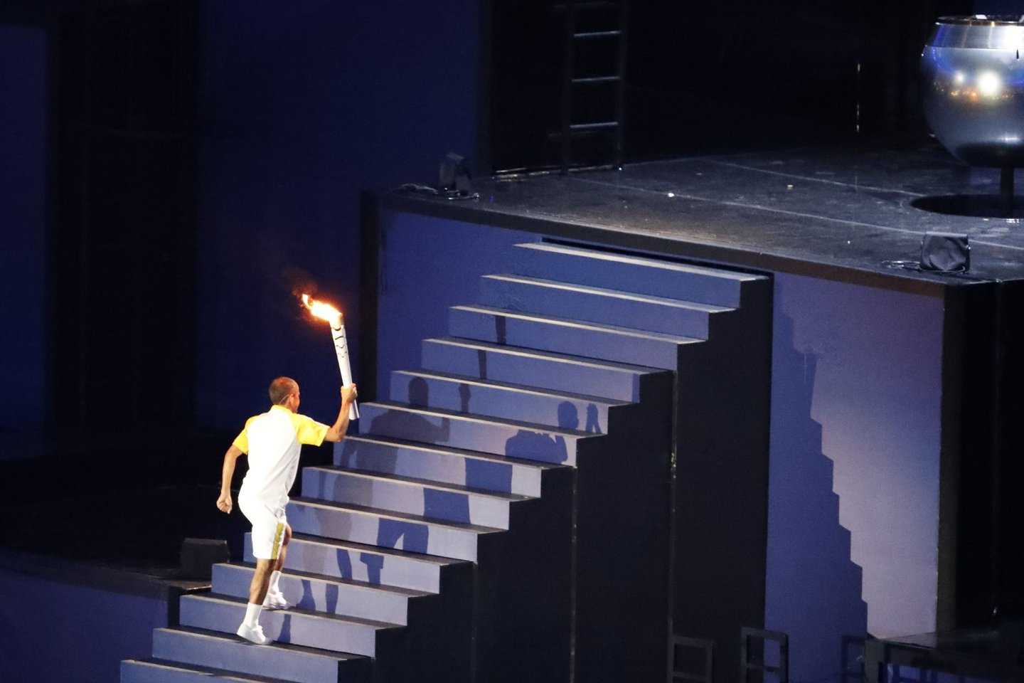 Former Brazilian athlete Vanderlei Cordeiro de Lima lights the Olympic cauldron with the Olympic torch during the opening ceremony of the Rio 2016 Olympic Games at Maracana Stadium in Rio de Janeiro on August 5, 2016. / AFP / Thomas COEX (Photo credit should read THOMAS COEX/AFP/Getty Images)