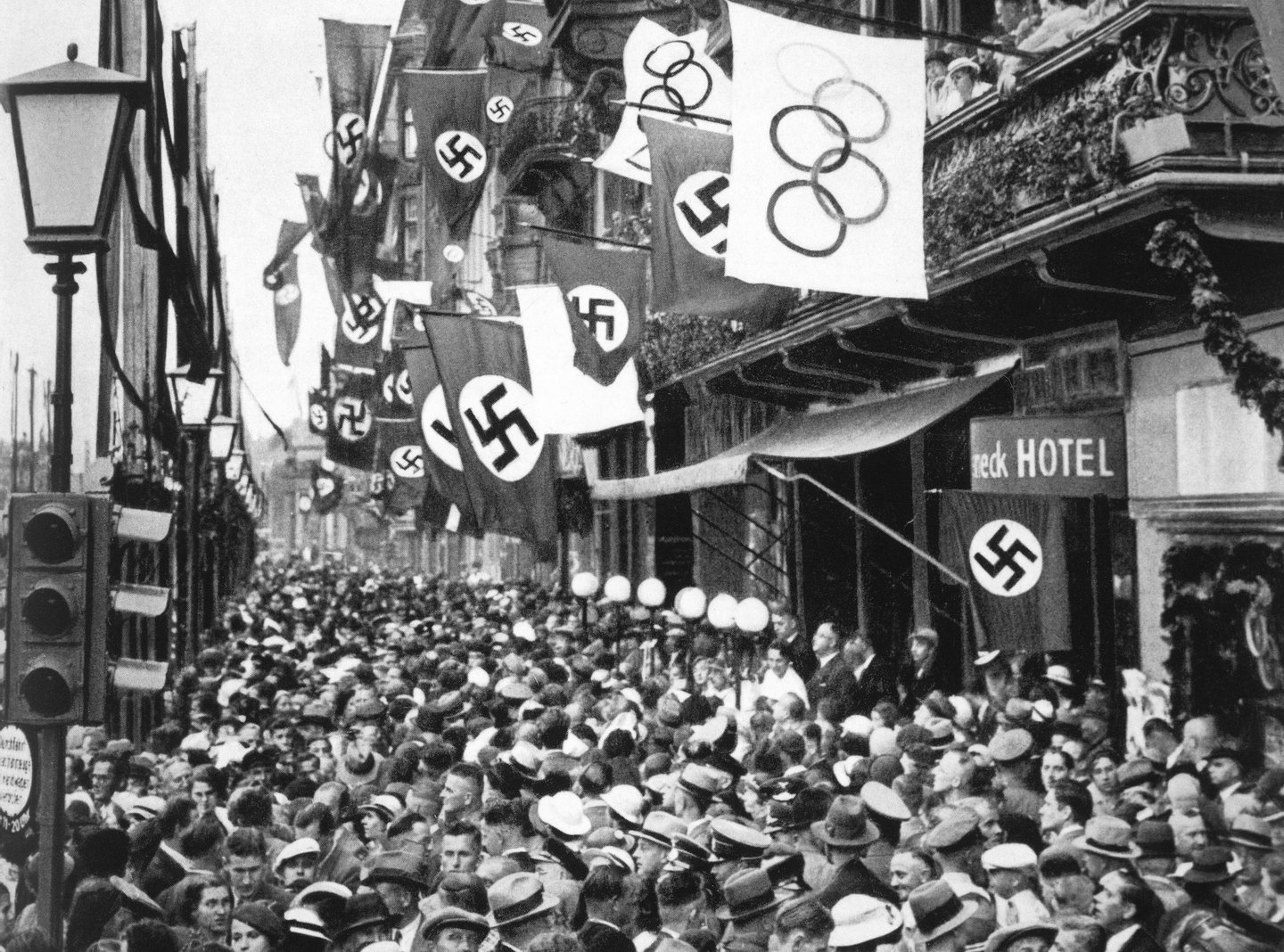 BERLIN - 1936: General view of crowd on a street in Berlin as Germany hosts the XI Olympic Games in August of 1936 in Berlin, Germany. (Photo by Getty Images)