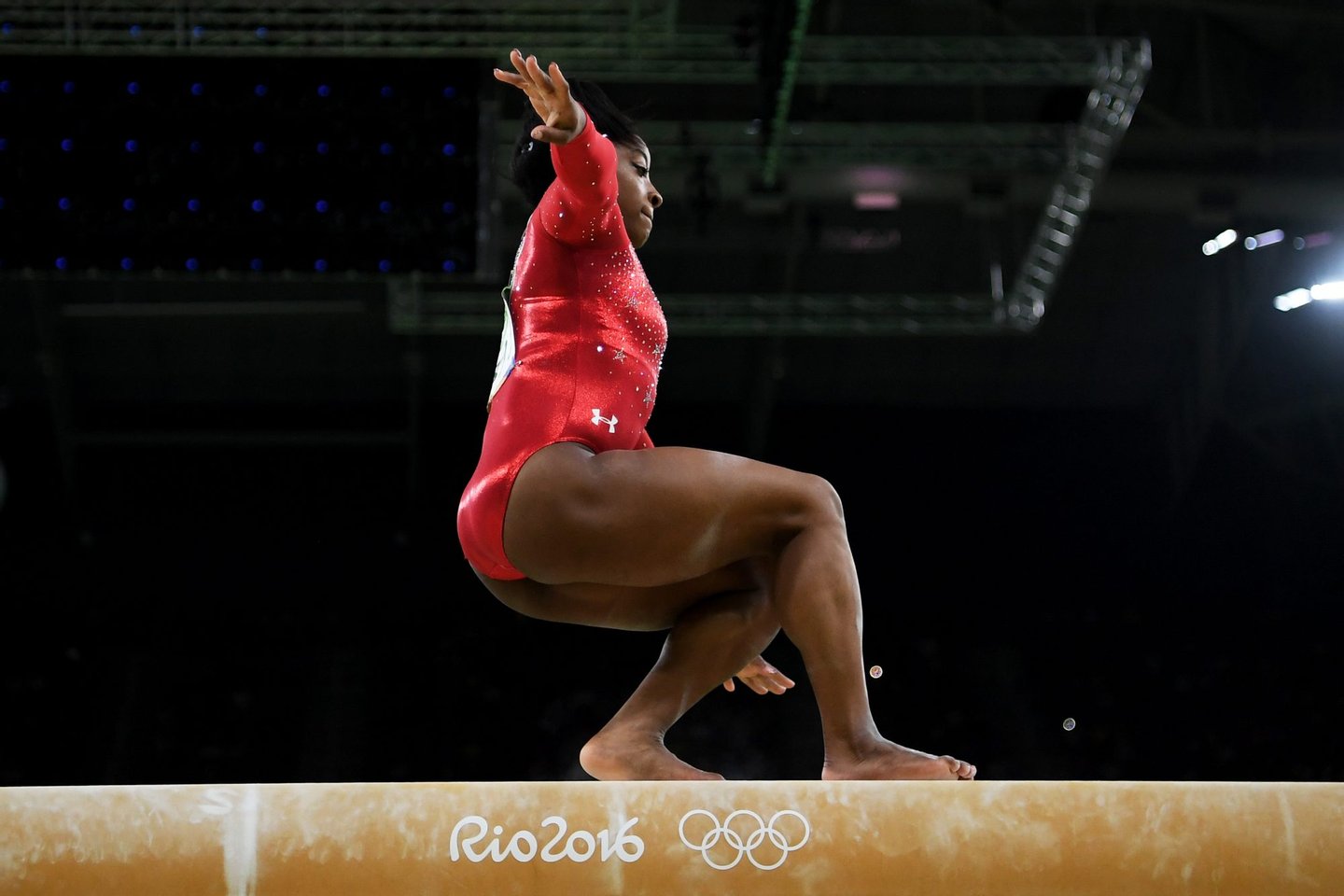 RIO DE JANEIRO, BRAZIL - AUGUST 15: Simone Biles of the United States slips while competing in the Balance Beam Final on day 10 of the Rio 2016 Olympic Games at Rio Olympic Arena on August 15, 2016 in Rio de Janeiro, Brazil. (Photo by Laurence Griffiths/Getty Images)