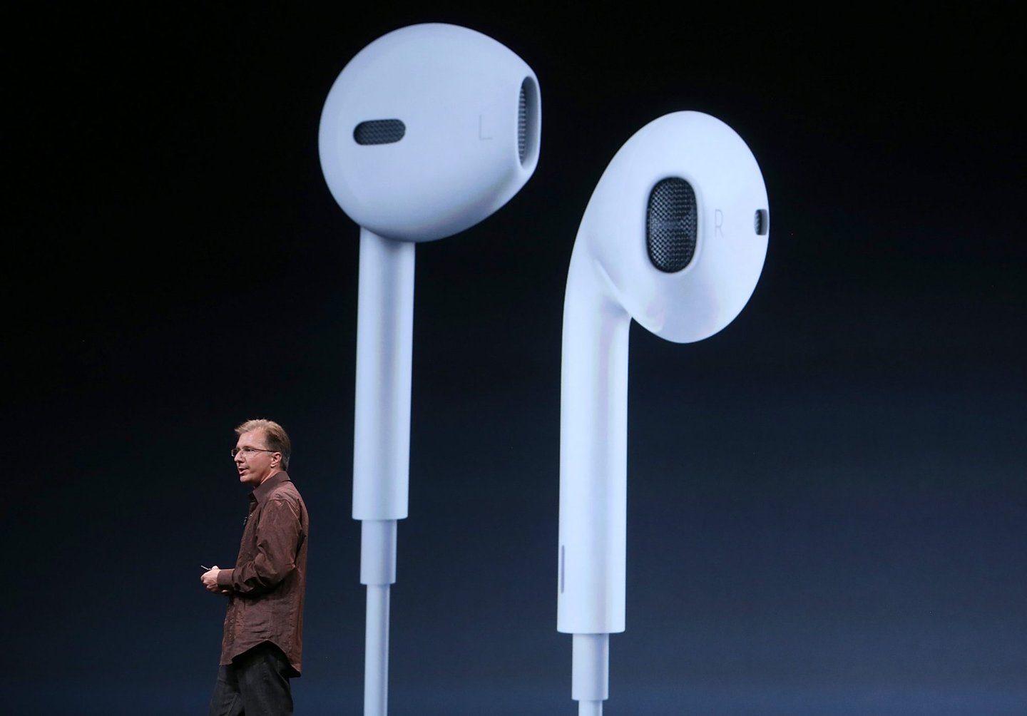 SAN FRANCISCO, CA - SEPTEMBER 12: Apple Vice President of iPod and iPhone Product Marketing Greg Joswiak, announces new Apple earphones called EarPods during an Apple special event at the Yerba Buena Center for the Arts on September 12, 2012 in San Francisco, California. Apple announced the iPhone 5, the latest version of the popular smart phone as well as new updated versions of the iPod Nano, Shuffle and Touch. (Photo by Justin Sullivan/Getty Images)