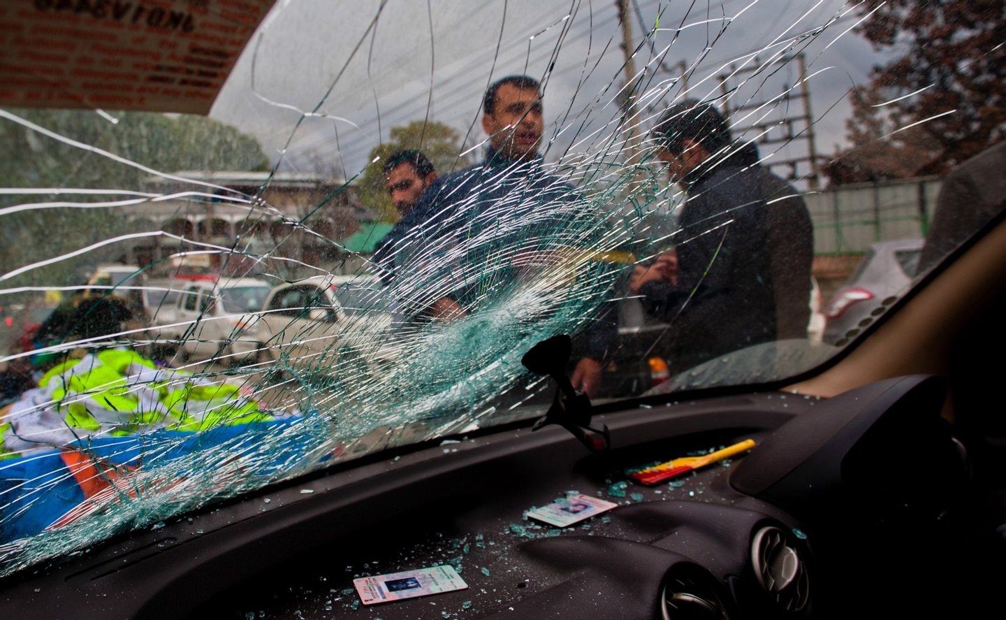 SRINAGAR - INDIA, OCTOBER 26: A damaged car hit by a tree branch is seen after a powerful earthquake struck northern Afghanistan, with tremors felt as widely as Pakistan and northern India on October 26, 2015 in Srinagar, the summer capital of Indian administered Kashmir, India. The magnitude 7.5 quake was centred in the mountainous Hindu Kush region, 45km (28 miles) south-west of Jarm, the US Geological Survey reported. Over 12 people have been reportedly killed in Pakistan while in Afghanistan at least 12 schoolgirls have died in a stampede during the evacuation process. (Photo by Yawar Nazir/ Getty Images)