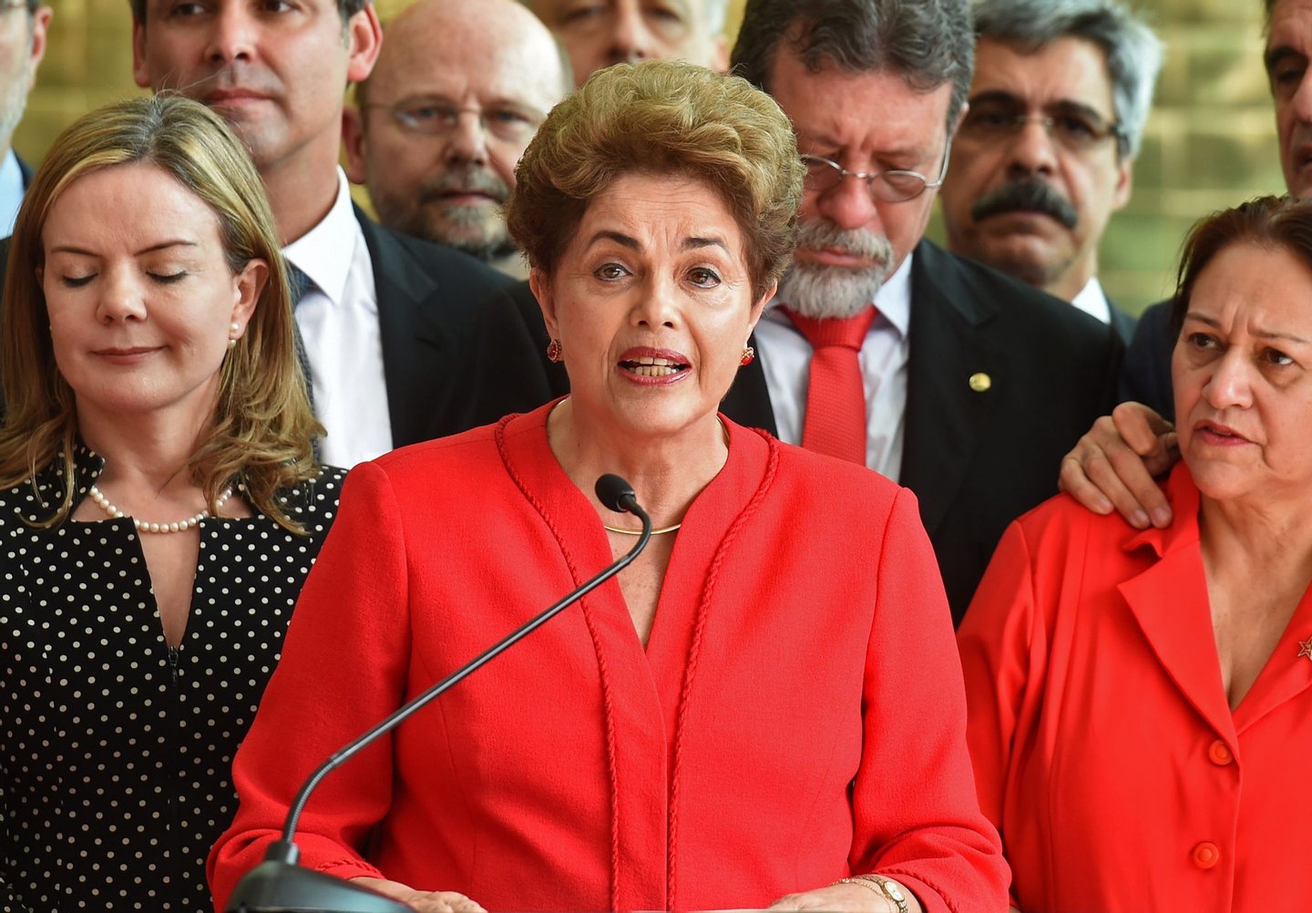Brazil's former Dilma Rousseff speaks at the Alvorada presidential palace in Brasilia after she was stripped of the country's presidency in a Senate impeachment vote on August 31, 2016. Rousseff was stripped of the country's presidency Wednesday in a Senate impeachment vote ending 13 years of leftist rule in Latin America's biggest economy. Rousseff, 68, was convicted by 61 of the 81 senators of illegally manipulating the national budget. The vote, passing the needed two-thirds majority, meant she was immediately removed from office. / AFP / EVARISTO SA (Photo credit should read EVARISTO SA/AFP/Getty Images)