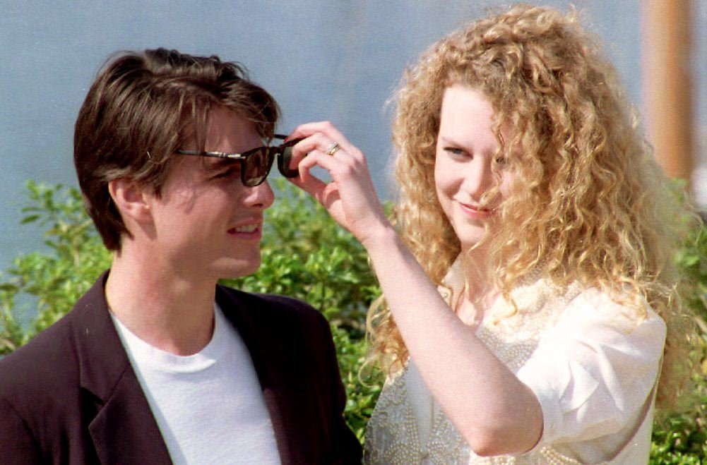 U.S. actor Tom Cruise and his wife Nicole Kidman pose for photographers 18 May, 1992 prior to the screening of the film "Far and Away" by U.S. director Ron Howard at the end of the 45th Cannes Film Festival. (Photo credit should read MICHEL GANGNE/AFP/GettyImages)