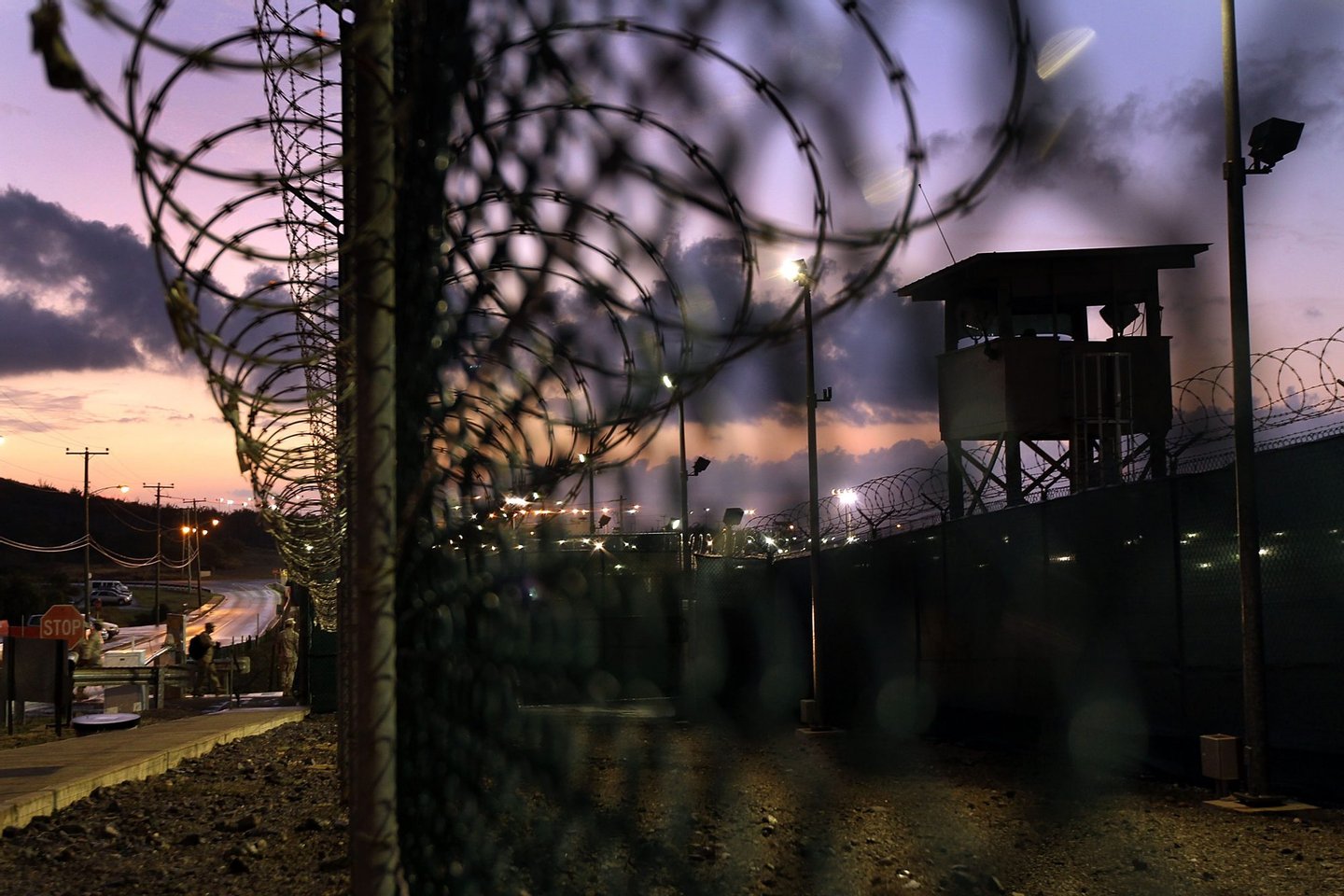 GUANTANAMO BAY, CUBA - MARCH 30: (EDITORS NOTE: Image has been reviewed by the U.S. Military prior to transmission.) A U.S. military guard arrives for work at Camp Delta in the Guantanamo Bay detention center on March 30, 2010 in Guantanamo Bay, Cuba. U.S. President Barack Obama pledged to close the prison by early 2010 but has struggled to transfer, try or release the remaining detainees from the facility, located on the U.S. Naval Base at Guantanamo Bay, Cuba. (Photo by John Moore/Getty Images)