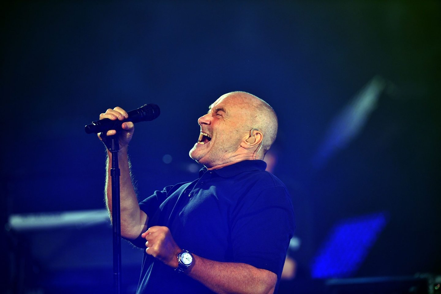 British singer Phil Collins performs during the opening ceremony of the 2016 US Open tennis tournament at the USTA Billie Jean King National Tennis Center in New York on August 29, 2016. / AFP / Jewel SAMAD (Photo credit should read JEWEL SAMAD/AFP/Getty Images)
