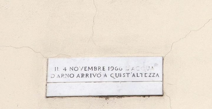 Florence, ITALY: Picture taken 27 October 2006 of the mark of the maximum level reached by the flood in Piazza Di Santa Croce in Florence after the flood on 04 November 1966. The floodwaters from the Arno River swept through the city and killed 87 people and poured tonnes of mud into museums and churches. Art restorers have appealed for money to rescue hundreds of works still caked in mud from floods in Florence 40 years ago. AFP PHOTO / ALBERTO PIZZOLI (Photo credit should read ALBERTO PIZZOLI/AFP/Getty Images)