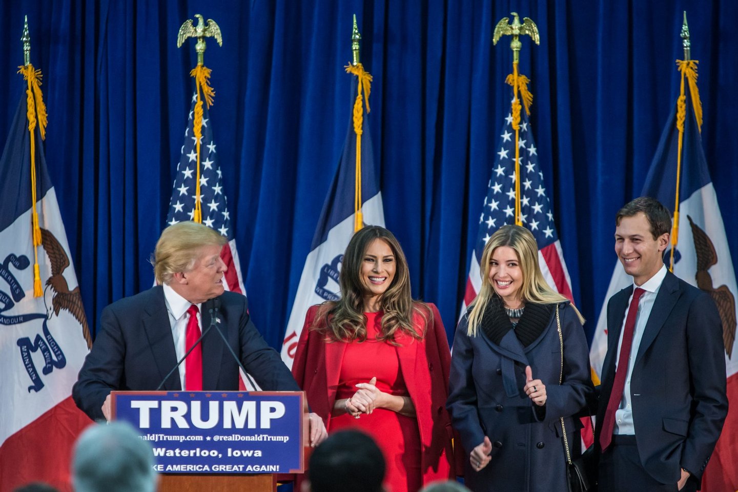 WATERLOO, IA - FEBRUARY 1: Republican presidential candidate Donald Trump (L) is joined on stage by his wife Melania Trump, daughter Ivanka Trump, and son-in-law Jared Kushner (L-R) at a campaign rally at the Ramada Waterloo Hotel and Convention Center on February 1, 2016 in Waterloo, Iowa. The Democratic and Republican Iowa Caucuses, the first step in nominating a presidential candidate from each party, will take place on February 1. (Photo by Brendan Hoffman/Getty Images)