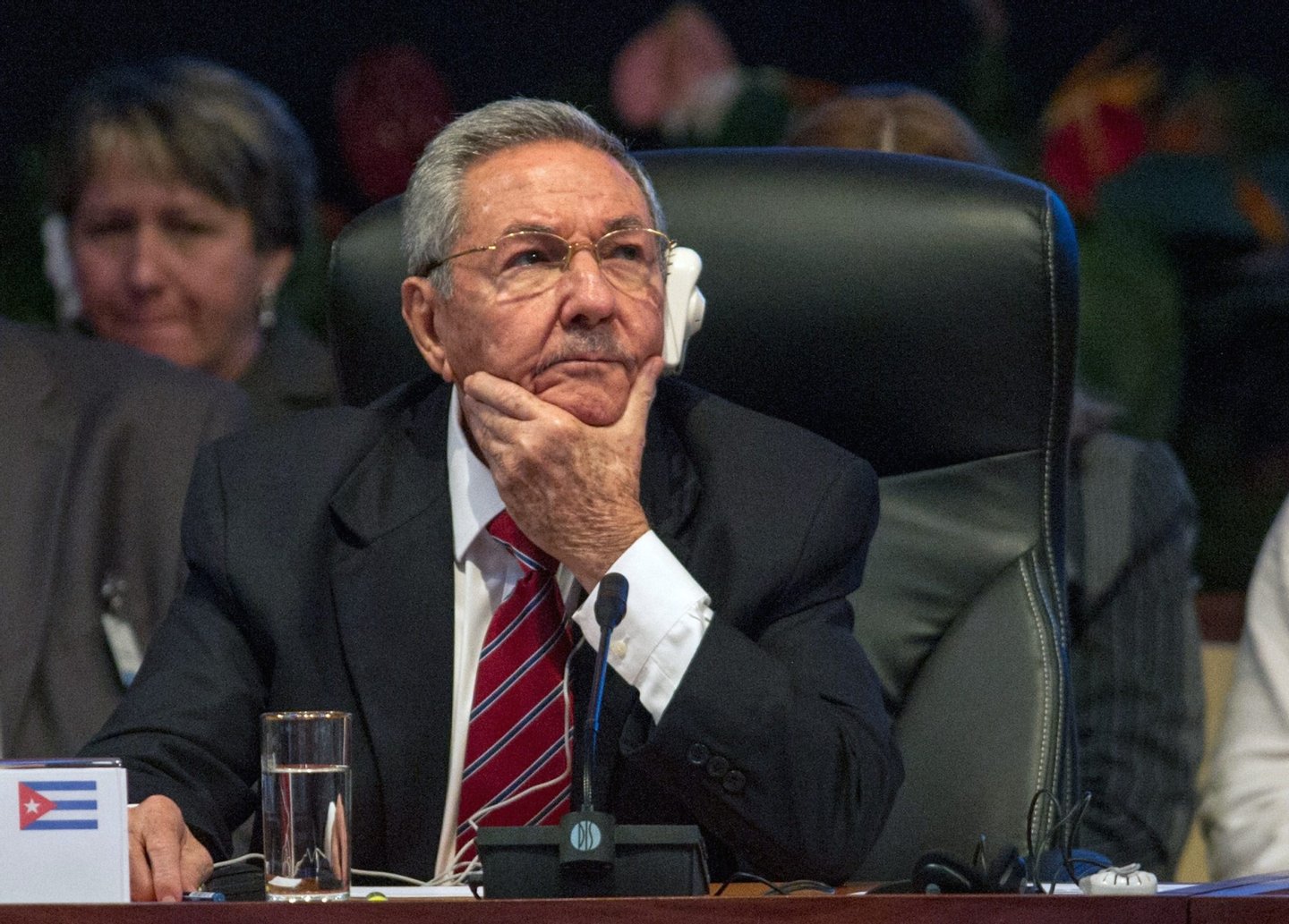 Cuban President Raul Castro listens during the opening of the Caribbean Community (CARICOM) Summit, in Havana, on December 8, 2014. The summit -- bringing together the 15 CARICOM member states and Cuba -- aims to increase trade and cooperation within the group and with Cuba. AFP PHOTO / YAMIL LAGE (Photo credit should read YAMIL LAGE/AFP/Getty Images)