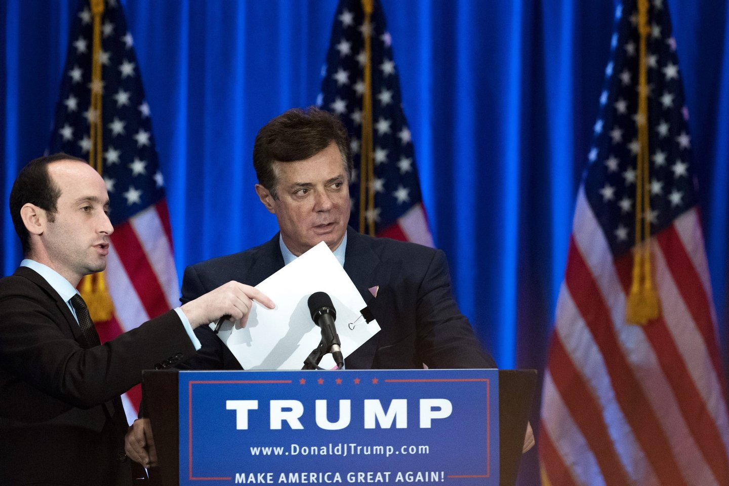 NEW YORK, NY - JUNE 22: Campaign chairman Paul Manafort checks the podium before Republican Presidential candidate Donald Trump speaks during an event at Trump SoHo Hotel, June 22, 2016 in New York City. Trump's remarks focused on criticisms of Democratic presidential candidate Hillary Clinton. (Photo by Drew Angerer/Getty Images)