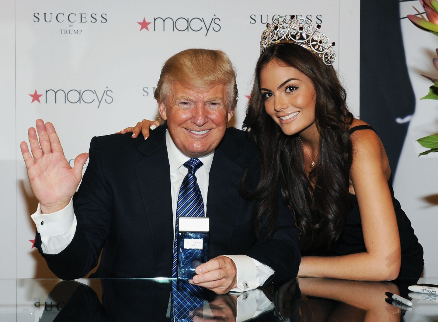 NEW YORK, NY - APRIL 18: Business mogul/TV personality Donald Trump and Miss Universe 2010 Ximena Navarrete (R) attend the Success by Trump fragrance launch at Macy's Herald Square on April 18, 2012 in New York City. (Photo by Slaven Vlasic/Getty Images)
