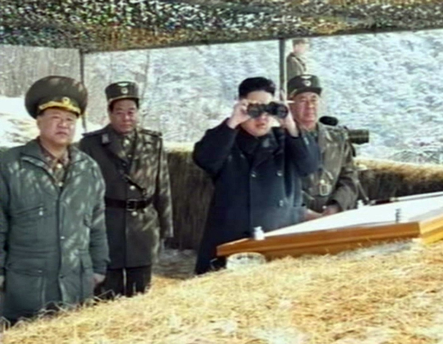 This video grab taken from North Korean TV on March 20, 2013 shows North Korean leader Kim Jong-Un's overseeing a live fire military drill. Kim Jong-Un oversaw a live fire military drill using drones and cruise missile interceptors, state media said, amid heightened tensions on the Korean peninsula. ----EDITORS NOTE --- RESTRICTED TO EDITORIAL USE - MANDATORY CREDIT " AFP PHOTO / NORTH KOREAN TV" - NO MARKETING NO ADVERTISING CAMPAIGNS - DISTRIBUTED AS A SERVICE TO CLIENTS - AFP PHOTO/HO/NORTH KOREAN TV (Photo credit should read NORTH KOREAN TV/AFP/Getty Images)