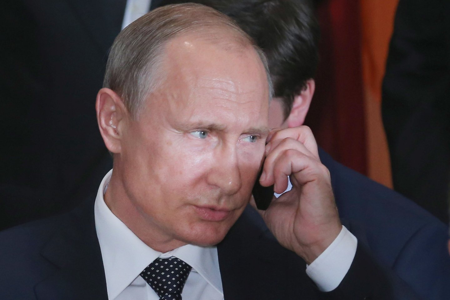 NEW YORK, NY - SEPTEMBER 28: (AFP OUT) Russian President Vladimir Putin takes a call during a luncheon hosted by United Nations Secretary-General Ban Ki-moon at the 70th annual UN General Assembly at the UN headquarters September 28, 2015 in New York City. U.S. President Barack Obama will hold a bilateral meeting with Putin later in the day. (Photo by Chip Somodevilla/Getty Images)