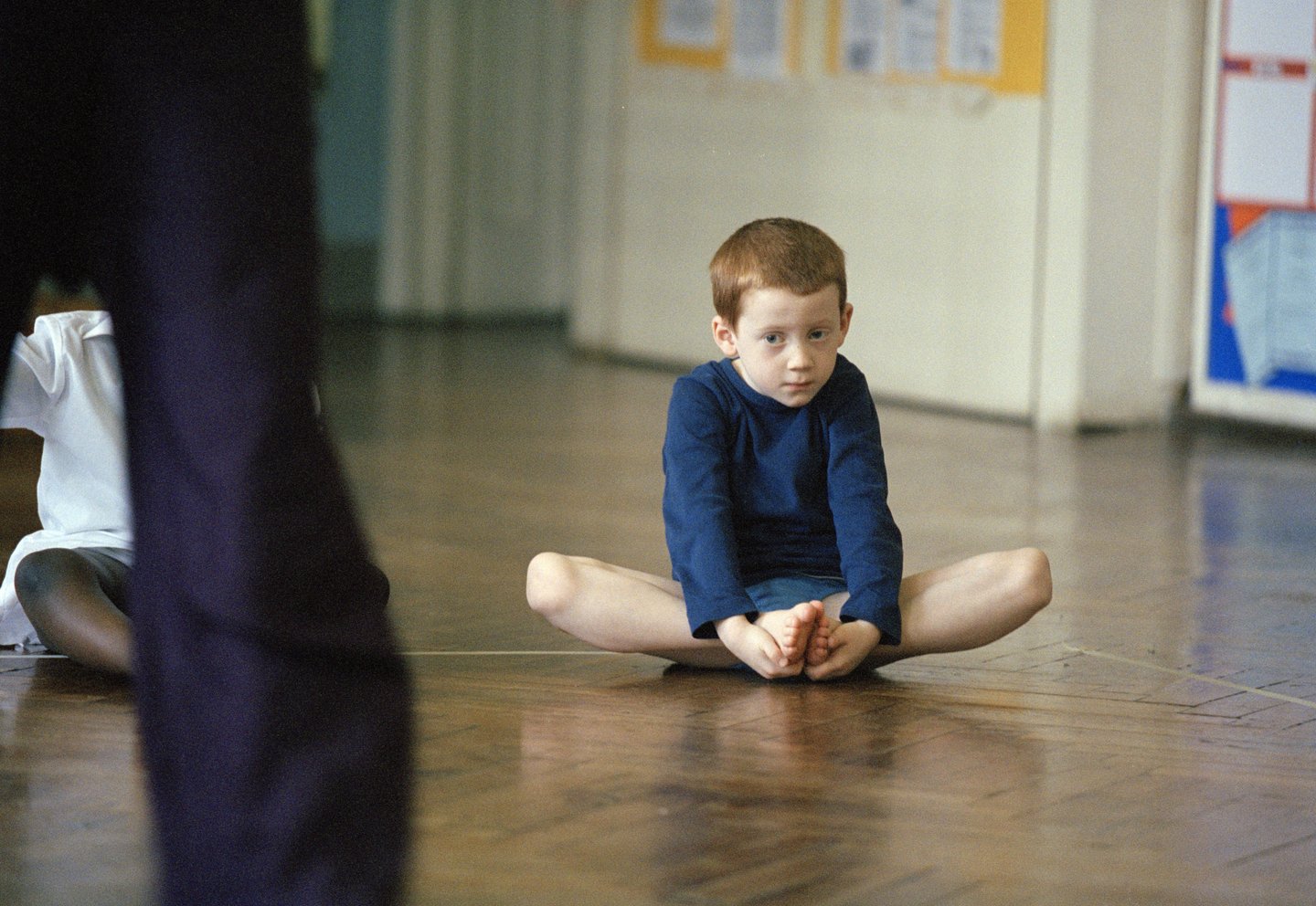 UK - Education - Stretching during a PE class