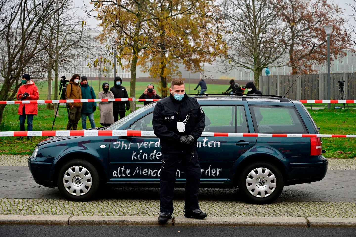 GERMANY-POLITICS-PROTEST-MERKEL