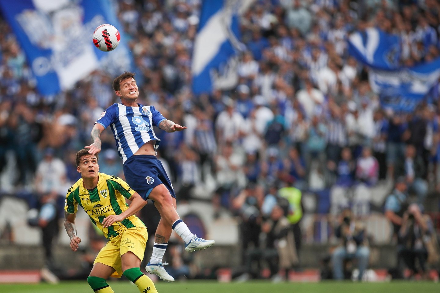 FC Porto's Otavio (R) fights for the ball with CD Tondela's Neto Borges (L) during the Portugal Cup final soccer match, between FC Porto and CD Tondela, at Jamor National stadium in Oeiras, outskirts of Lisbon, Portugal, 22 May 2022. MARIO CRUZ/LUSA